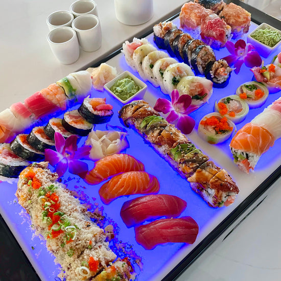 FDA approved cutting boards for use in a Dubler cooler. The chilled food trays are great for helping preserve charcuterie or sushi spreads.